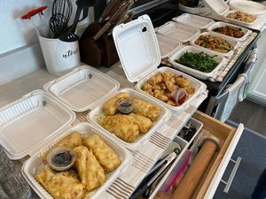 Boxes of takeout at Nature Vegetarian Restaurant in Oakland