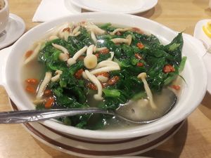 Pea sprouts with truffle and gogi at Nature Vegetarian Restaurant in Oakland