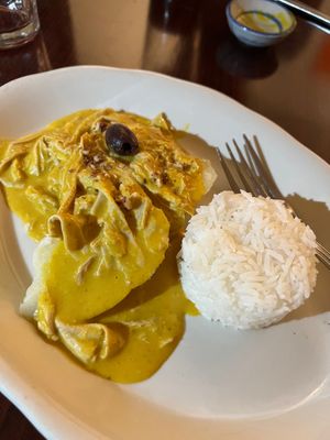Aji Amarillo Unchicken (entrée of yuba/tofu skin in a creamy sauce made from pecans, bread, oat milk, yellow hot peppers and Peruvian red peppers, served with potatoes and rice) at Andean Garden - Cloud Kitchen - Maybe closed in Brooklyn
