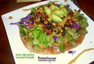 Mexicali Tostada Salad with Raw Vegan Creamy Chipotle Dressing at Pura Vida Pantry in Herradura