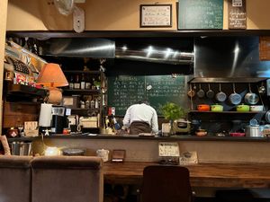 Pretty kitchen and friendly owner at Cafe Banmari in Mishima