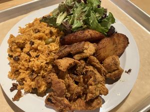 Sampler platter with chicken  at Casa Borinqueña in San Francisco