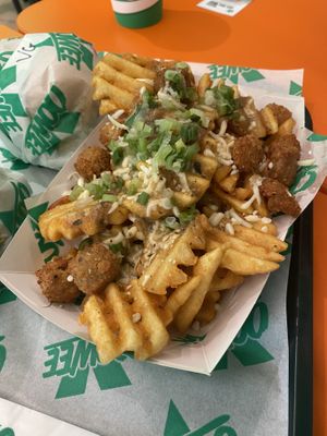 Cluckin Waffle Fries (Sharing size)  at Oowee Vegan in Brighton