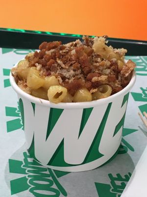 Vegan mac n’ cheese with vegan ‘bacon’ and onion.  at Oowee Vegan in Brighton