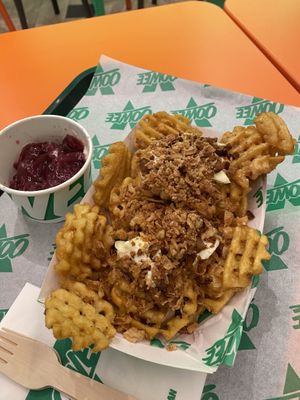 2023 Christmas special: Truffle Fondue Fries – Sharing size (we got the cranberry sauce in a pot on the side as my wife doesn't like cranberry)  at Oowee Vegan in Brighton