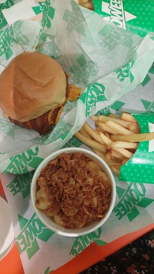 Double bacon cheeseburger, regular fries and mini mac and cheese! at Oowee Vegan in Brighton
