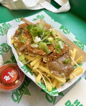 Cluckin’ fries  at Oowee Vegan in Brighton