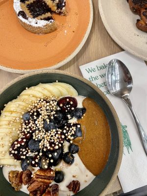 Yogurt bowl and a pastry  at Holy Llama - Sintagma in Athens