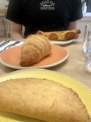 Pie, croissant, puff dog.  at Holy Llama - Sintagma in Athens