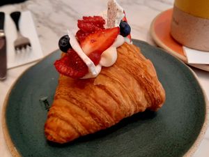 Croissant filled with vanilla cream and strawberry sauce - SO GOOD at Holy Llama - Sintagma in Athens