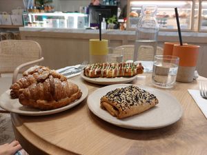 Puffdog, sesame mushroom bun and 2 almond croissants at Holy Llama - Sintagma in Athens