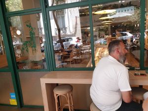 Lots of seating options, air conditioning inside at Holy Llama - Sintagma in Athens