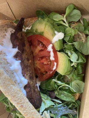 Inside of a BLT - this was the best sandwich! Great flavour 😋  at Holy Llama - Sintagma in Athens