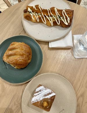 A puff dog (top), pain au chocolat (middle) & praline cruffin (bottom)   at Holy Llama - Sintagma in Athens