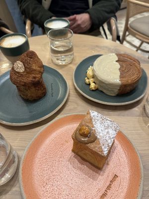 Tiramisu cruffin, caramel wheel, hazelnut praline cube croissantt   at Holy Llama - Sintagma in Athens