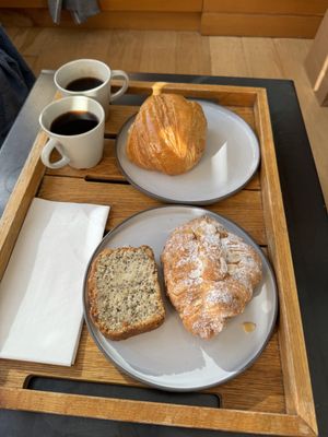 Takeaway of a pain au chocolat, almond croissant and lemon and Chia cake  at Holy Llama - Sintagma in Athens