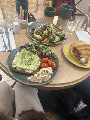 Avocado meal left Front / caprese Croissant left Front  at Holy Llama - Sintagma in Athens