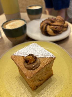 Praline duffin (doughnut-muffin combo filled with hazelnut cream) and a chocolate babka (braided bread)  at Holy Llama - Sintagma in Athens