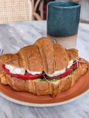 Caprese croissant and a green juice at Holy Llama - Sintagma in Athens