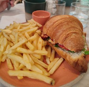 Savoury brunch: croissant with bbq tempeh and veggies, french fries, and spicy mayo at Holy Llama - Sintagma in Athens