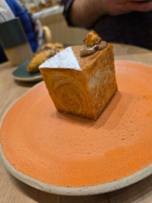 Cuffin. It's filled with a chocolate hazelnut filling. at Holy Llama - Sintagma in Athens