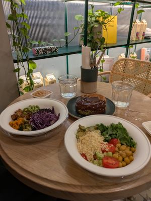 Lunchtime tofu and chickpea salad bowls with the pistachio wheel of dreams! at Holy Llama - Sintagma in Athens