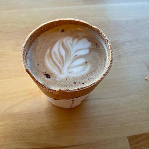 Flat white in an edible cup. at Balance Me Out in Sacramento
