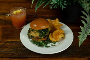 Garden Monster (Entree) - Impossible, onion jam, house aioli, onion petals, crispy kale and "cheddar cheese" with spiral fries.  at Roots in Riverside