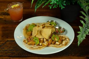 Crispy "Chicken" Tacos (Entrees) - Choice of "Chicken", "Carnitas", "Shrimp" tacos with a side of chips, guacamole and pico de gallo.  at Roots in Riverside