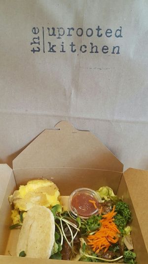 tempeh burger, side salad and smashed potatoe at The Uprooted Kitchen in Gilbert