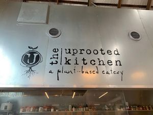 Sign aboce the food prep area at The Uprooted Kitchen in Gilbert