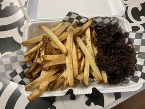 Fries and chorizo to go  at The Vegan Vato in Victorville