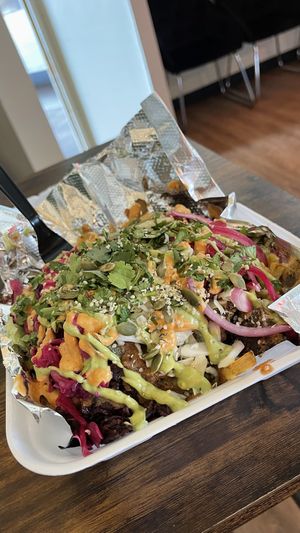 asada fries are FIRE🔥  at The Vegan Vato in Victorville