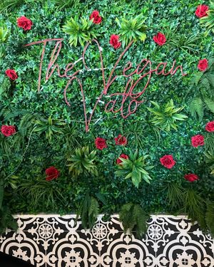 Sign on faux living wall at The Vegan Vato in Victorville