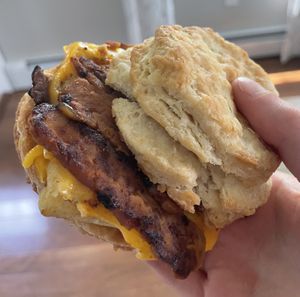 Sunday brunch special: bacon egg & cheeze on a biscuit—SO GOOD  at Basil & Bunny in Bristol