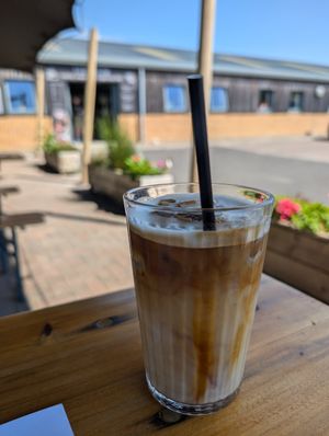 Delicious iced oat latte - their default is mylk which is so so so good of them at Fire & Flow Coffee Roasters in Cirencester