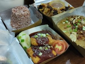 Tofukatsu front, fried veg dumplings at the back, noodle palabok on right at Vegan Cebu CIty - Wholefoods Plant-Based Cafe in Cebu