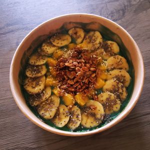 Their Greenfield Smoothie Bowl. Mango, Banana, Barley topped with fresh fruits, nuts and seeds. #Veganuary at Vegan Cebu CIty - Wholefoods Plant-Based Cafe in Cebu