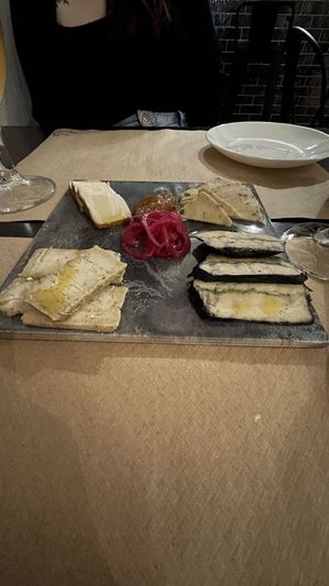 Vegan cheese selection with home made marmalade and pickled onion  at La Perra Verde in Barcelona