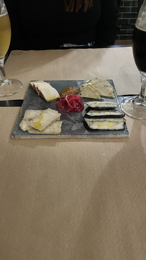 Vegan cheese tapa with home made marmalade and pickled onion  at La Perra Verde in Barcelona
