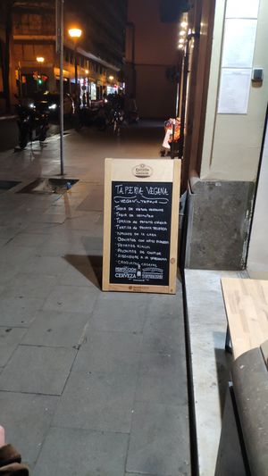 Sign outside at La Perra Verde in Barcelona