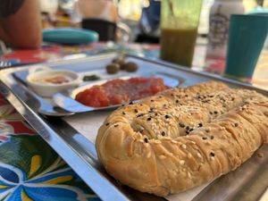 Borek, served with tomato, olives, skug and tahini. So good!  at PENTAGON in Lisbon