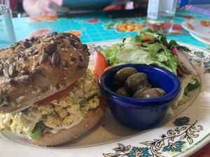 Tofu scramble and bagel (tastes like the BEST vegan “egg” salad)   at PENTAGON in Lisbon