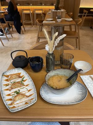 Miso soup and gyoza and green teaa  at Bloom Sushi in Paris