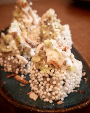 Mr. Crunch Shiitake, oyster mushroom, avocado,
masago arare, truffle sauce at Bloom Sushi in Paris