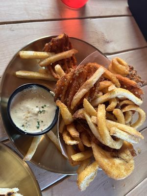Mixed Bag of Fries served with a creamy vegan dipping sauce  at Odie B's in Denver