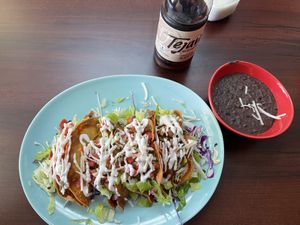 4 Crispy Tacos (with black beans and iced tea) I chose potato filling ‘cause I was craving potatoes.  It was excellent!   at El Cantaro Vegan Taqueria in Sacramento