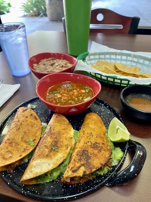 “Beef” Birria Tacos with a side of pinto beans   at El Cantaro Vegan Taqueria in Sacramento