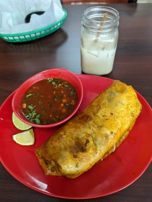 Quesabirria with consomme and horchata to drink! at El Cantaro Vegan Taqueria in Sacramento