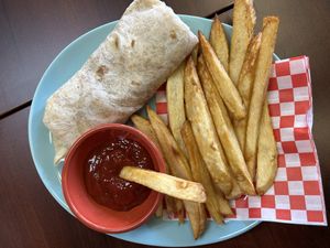 Kids bean and cheese burrito with fries   at El Cantaro Vegan Taqueria in Sacramento